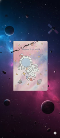 cute A5 softcover notebook featuring an astronaut flying among planets against a pastel galaxy background with stars and spaceships