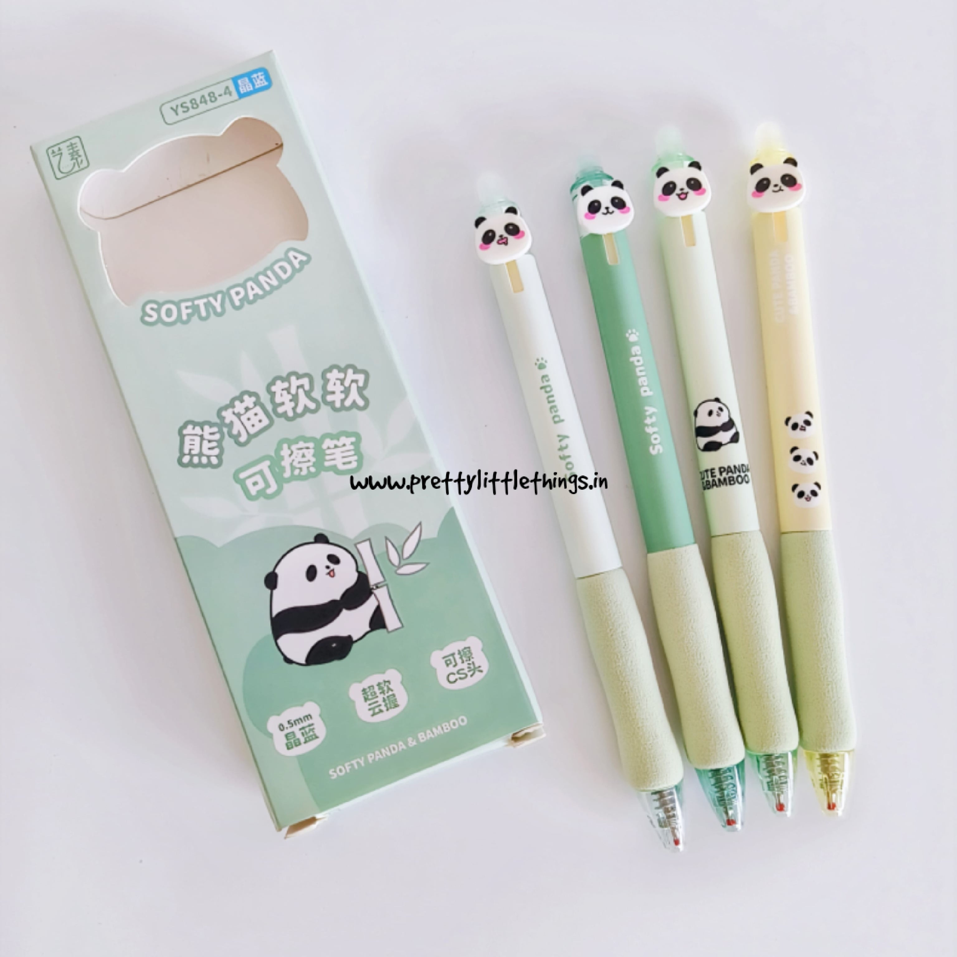 Set of four panda-themed pens with a packaging box on a white background. 