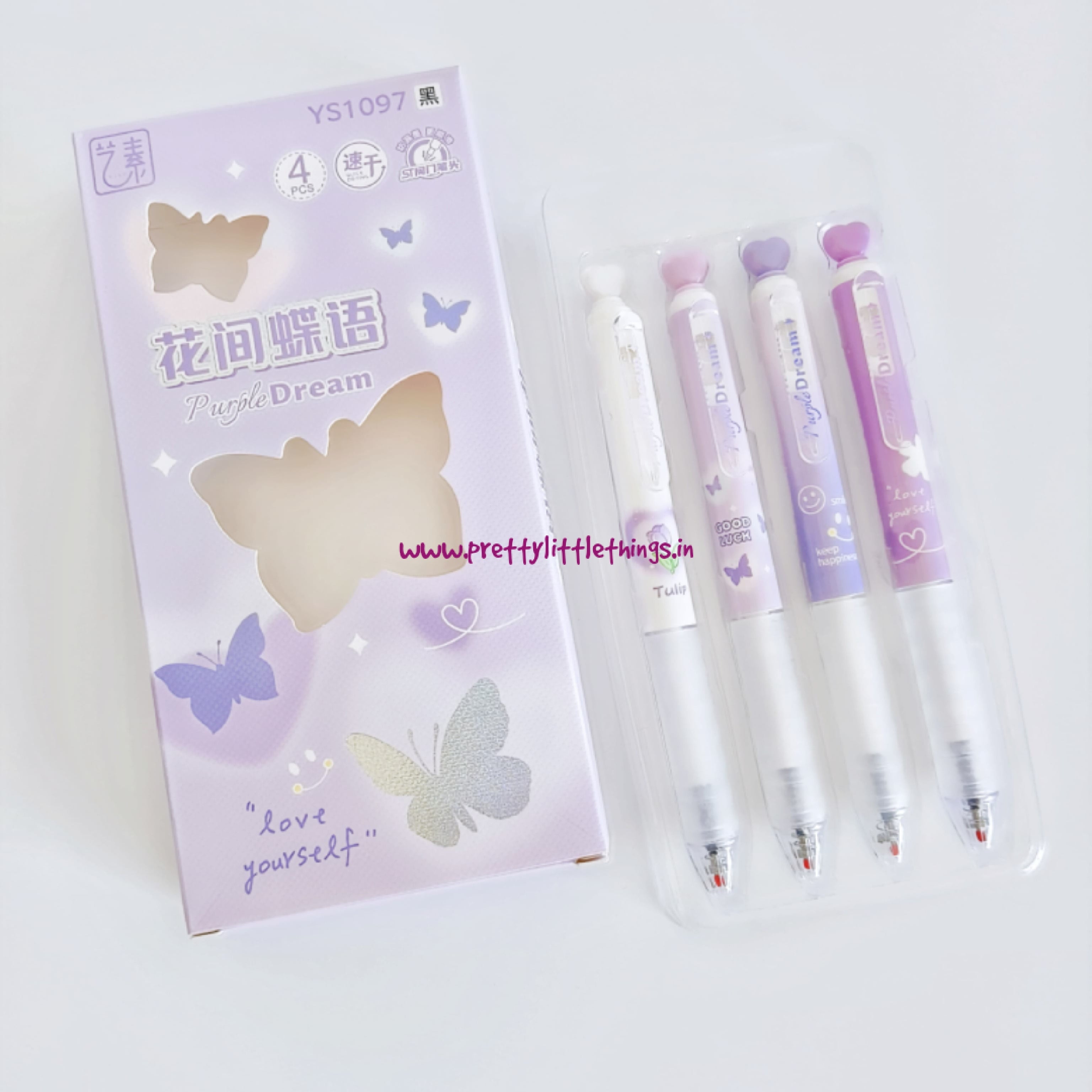 Set of butterfly-themed purple colored gel pens with packaging on a white background