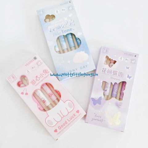 Three packs of pens with cute designs on a white background